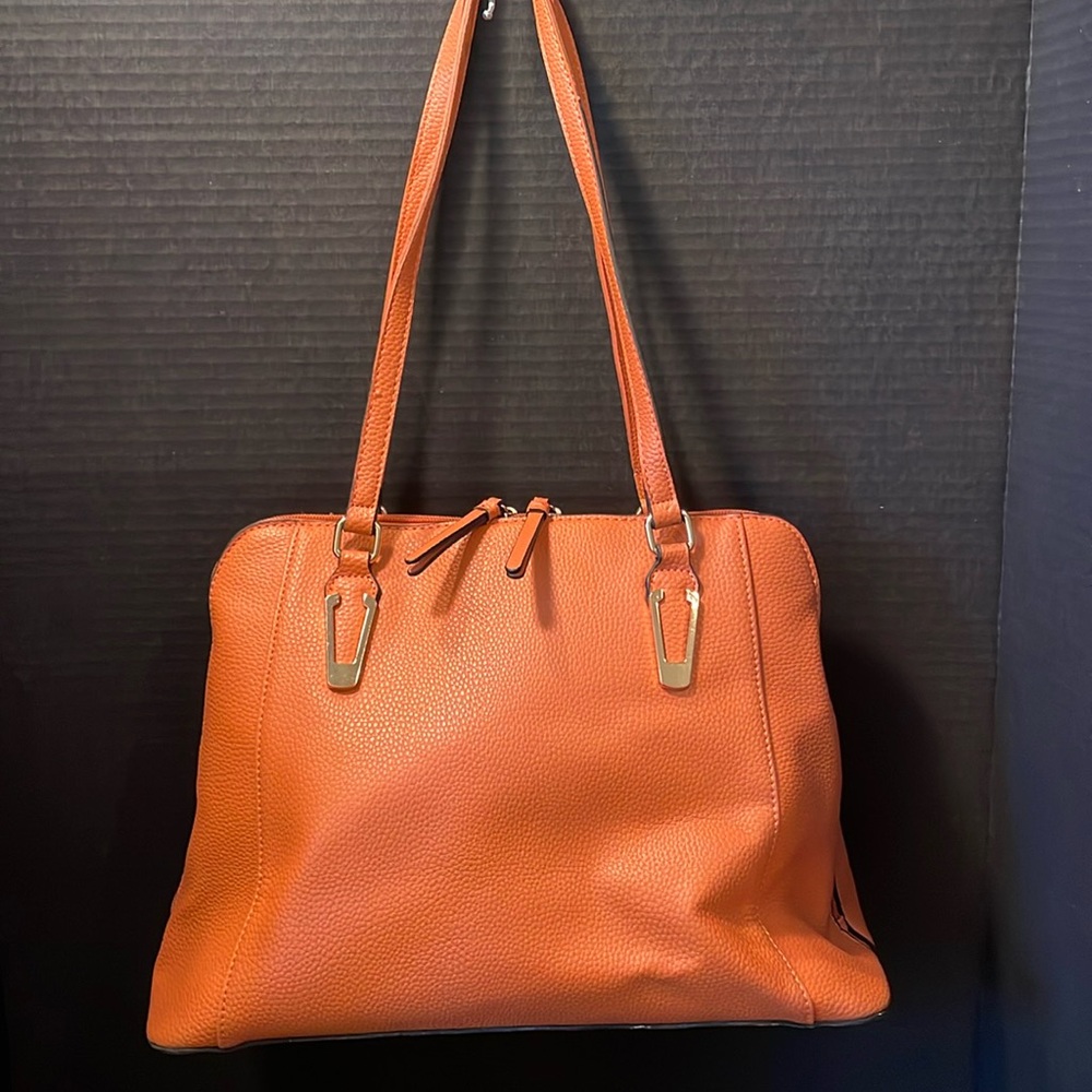Lily and Ivy zippered faux leather handbag in coral.